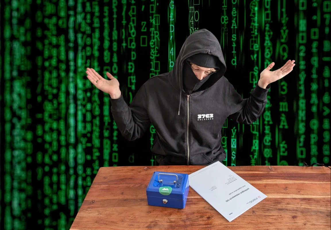 A hacker being frustrated by the fact that the completed audit report provides them with no way to crack zeitkapsl