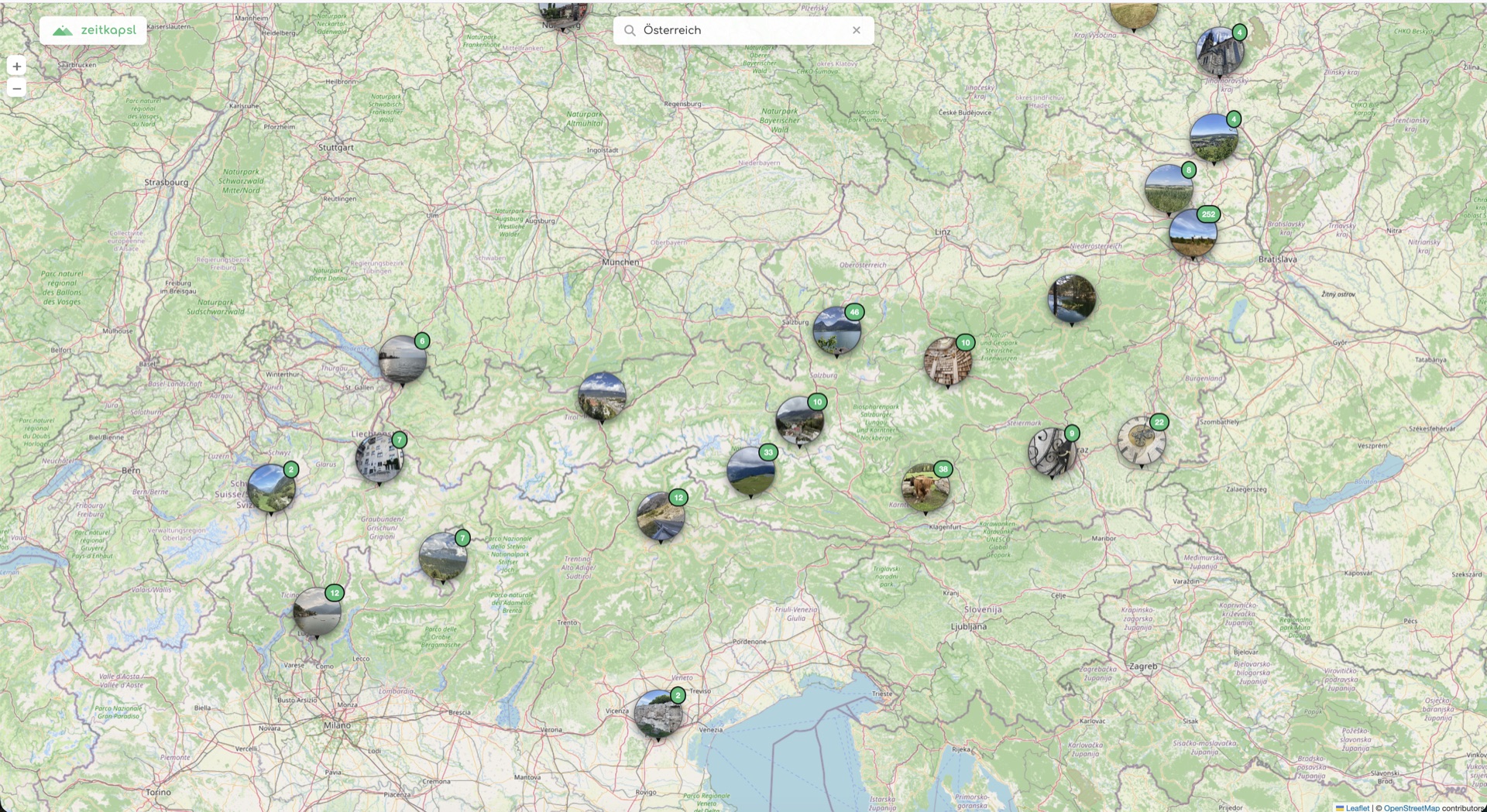 The map view, with nearby photos grouped into clusters across a region